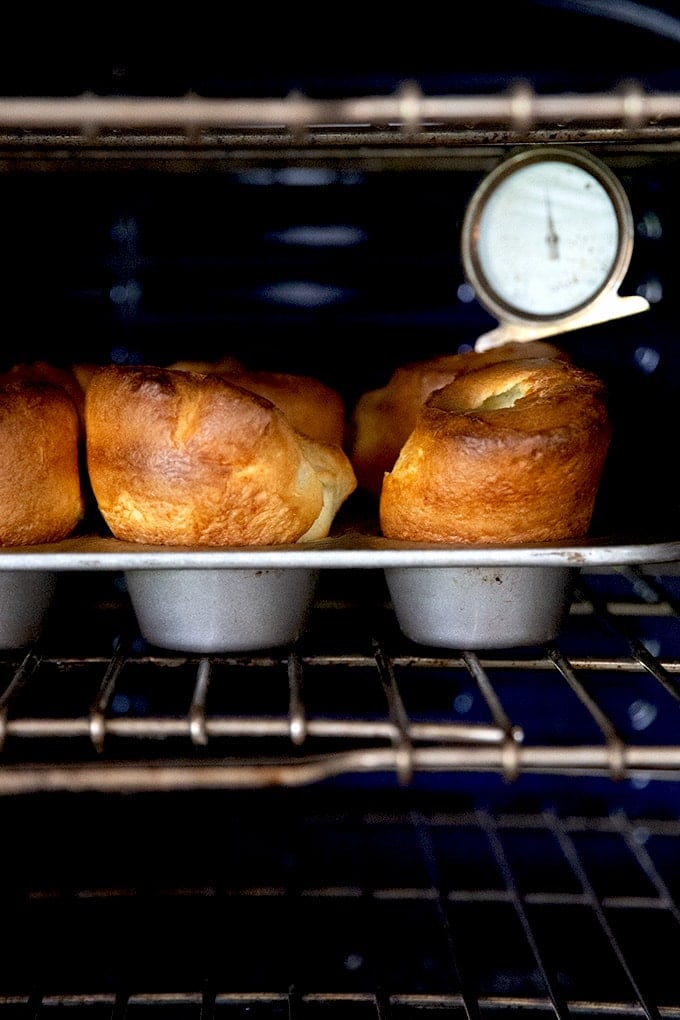 A tray of popovers in the oven.