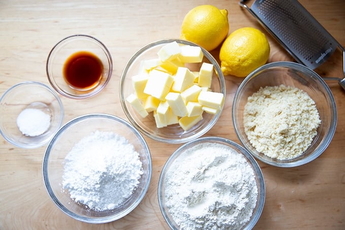 Portioned ingredients to make lemon-almond snowball cookies.