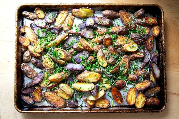 Roasted fingerling potatoes showered with fresh herbs.