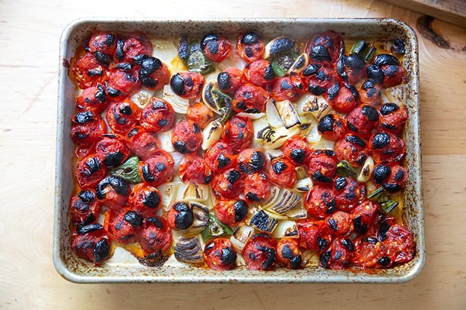 A small sheet pan with just-broiled tomatoes, onions, garlic, and jalapeños. - 4