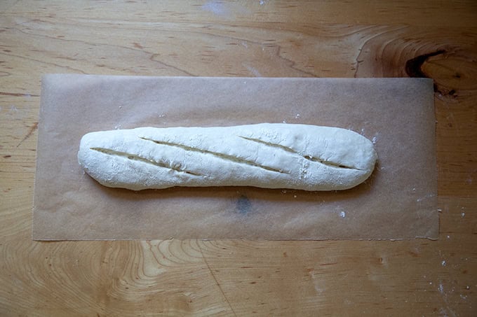 Scored baguette ready for the oven.