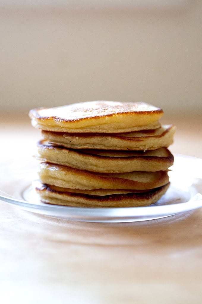 A stack of sourdough discard pancakes on a plate.