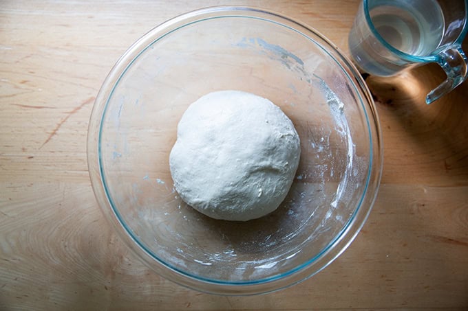 Baguette dough, stretched and folded, in a bowl.