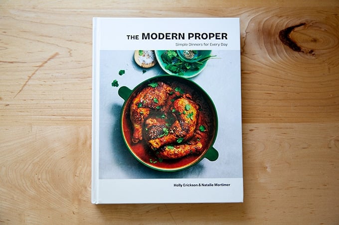 The Modern Proper cookbook on a countertop.
