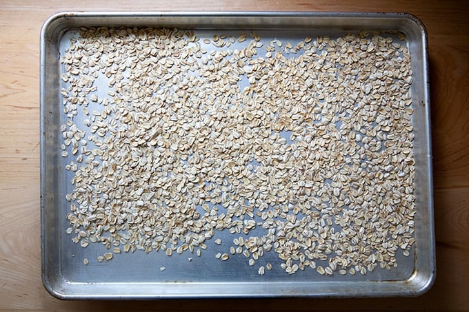 Toasted oats on a sheet pan.