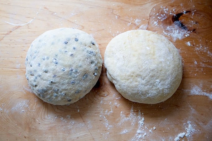 Two balls of hot cross bun dough.