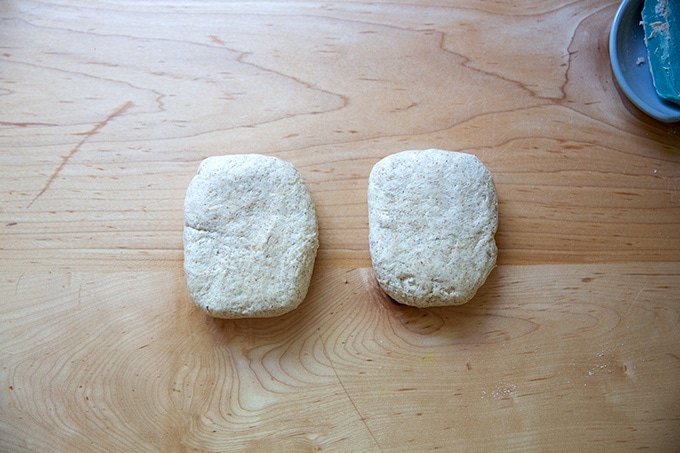 Two portions of sourdough cracker dough.
