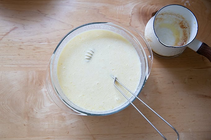 The wet ingredients to make sourdough discard waffles all stirred together.