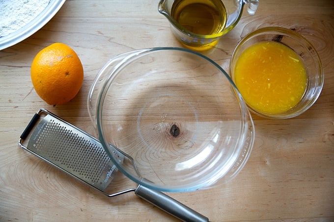 Wet ingredients for orange and olive oil cake, unmixed.