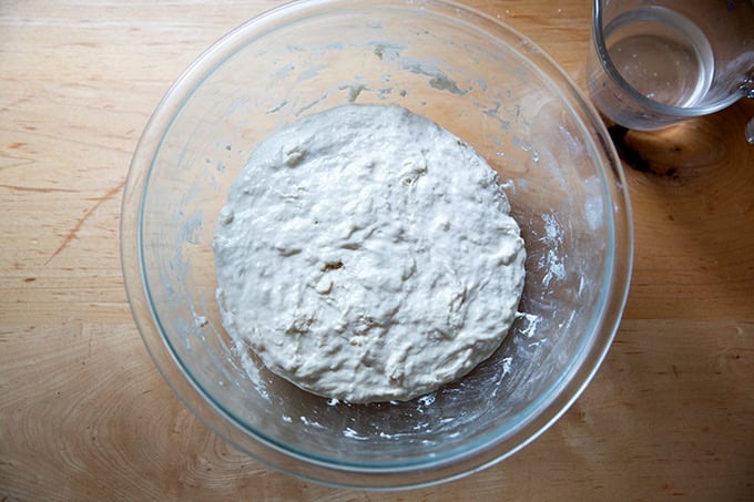A bowl of sourdough dough 30 minutes after the first mix. - 26