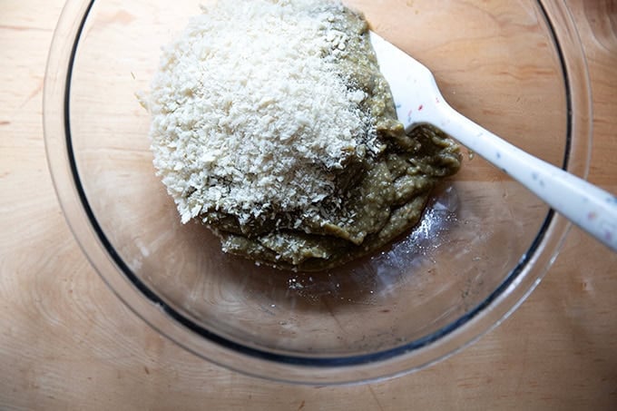 Adding the bread crumbs to the eggplant purée. - 8