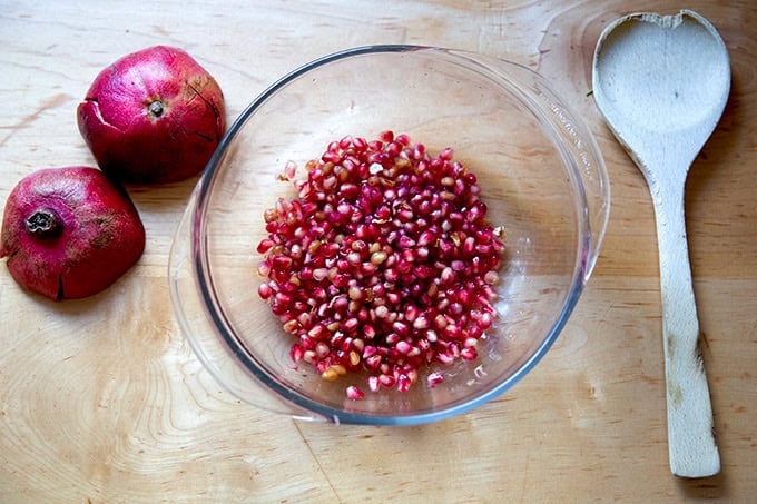 A bowl full of pomegranate arils.