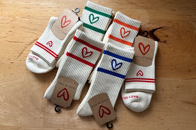 House of Shan socks on a countertop.