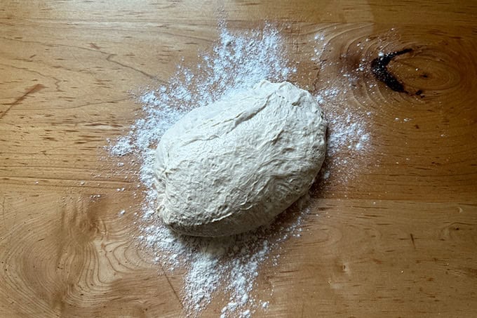 Monkey bread dough turned out onto a counter top. - 67