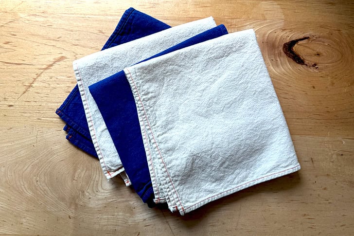 A set of four cloth napkins made by Utility Canvas.