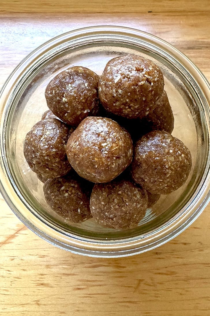 A jar filled with no-bake energy bites.