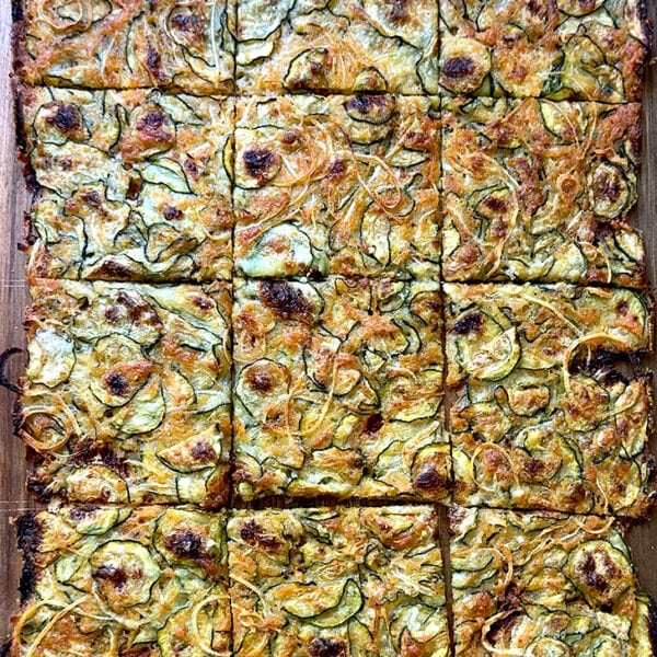 Zucchini Scarpaccia cut into 12 squares.