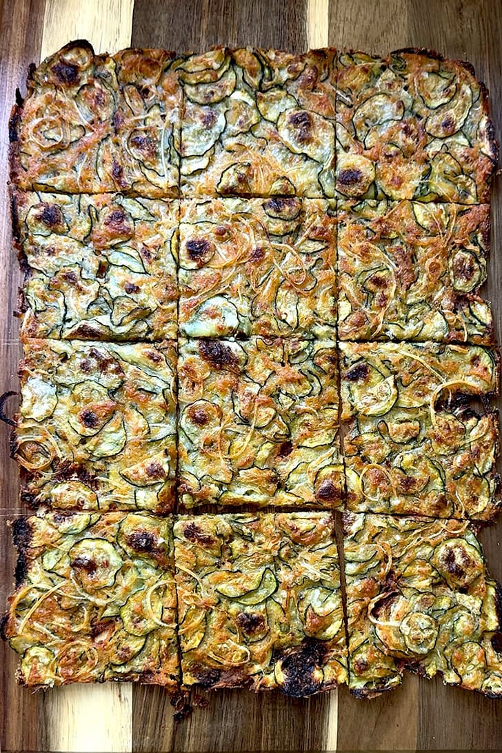 Zucchini Scarpaccia cut into 12 squares.